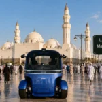 Autonomous RoboBus operating near Masjid Quba in Madinah, Saudi Arabia, showcasing AI-powered smart mobility and future transportation technology by Branch Bots.