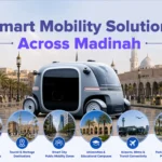 Promotional visual by Branch Bots showing the PIX RoboBus autonomous vehicle in front of Medina city landmarks and المسجد النبوي. The graphic highlights smart mobility applications across Madinah including pilgrimage transportation routes, tourist destinations, smart public mobility zones, universities, airports, metro connectivity, and public parks.